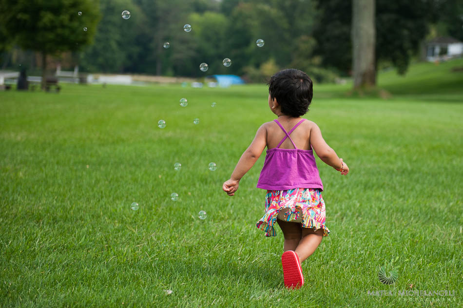 Girl toddler Bubbles running green fuel summer